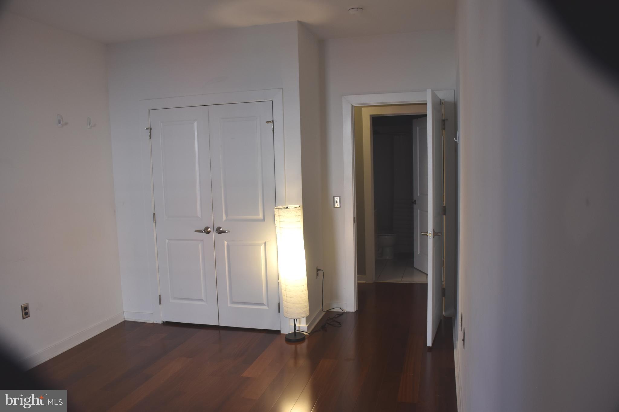 2007 Clipper Park Road, Unit 212 Baltimore, MD 21211 - Photo 15 of 33 an empty room with closet