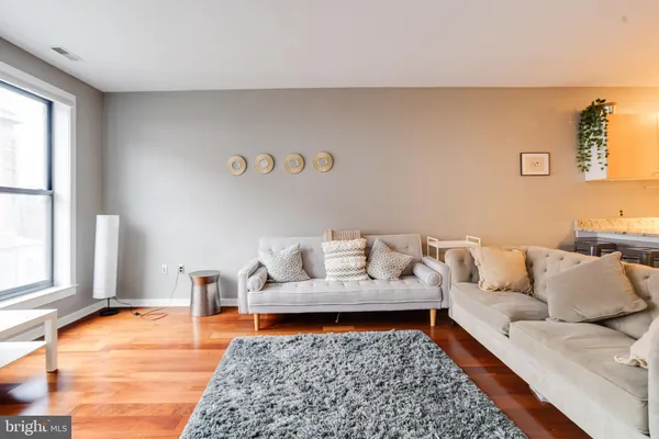 a living room with furniture and a couch