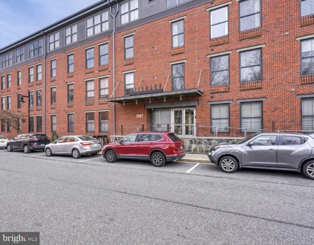 a car parked in front of a building