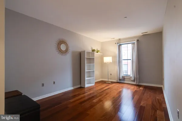 a view of livingroom with hardwood floor and window