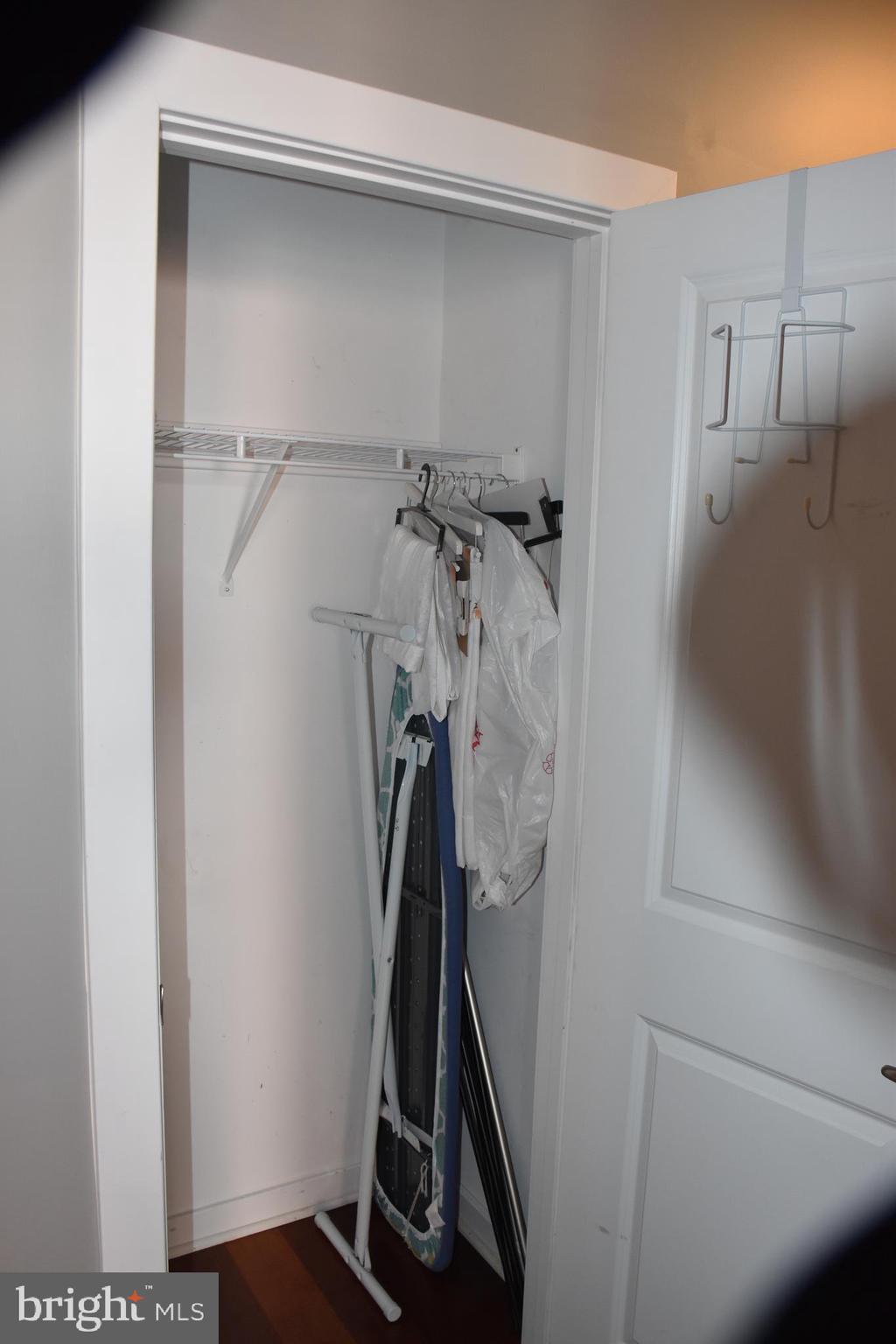 2007 Clipper Park Road, Unit 212 Baltimore, MD 21211 - Photo 25 of 33 a view of walk in closet with empty racks