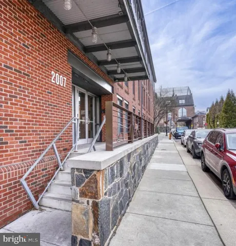 a view of entryway with a front door