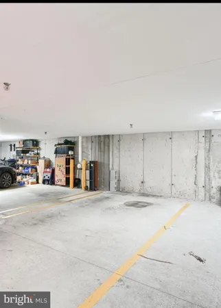 a view of parking and utility room