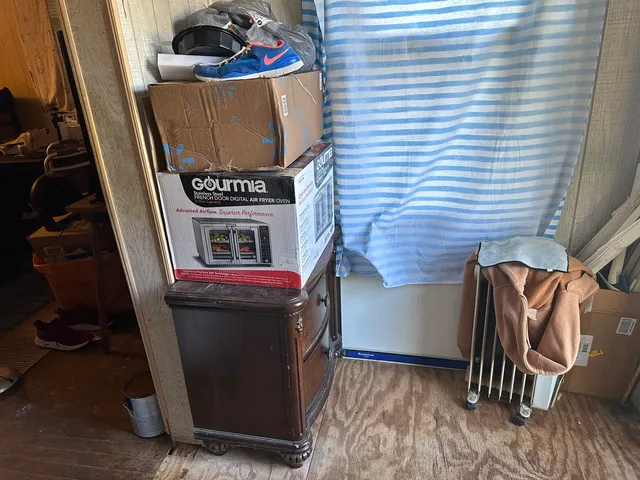 a front view of a house with seating space