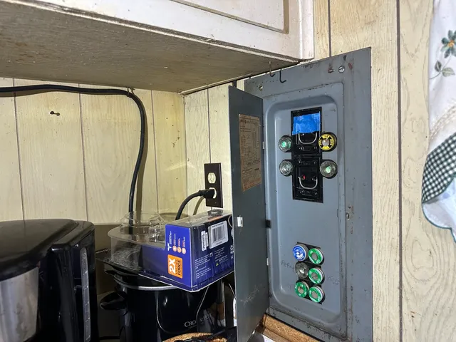 a view of a backyard with sitting area and garden