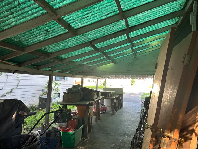 a view of outdoor space with porch and furniture
