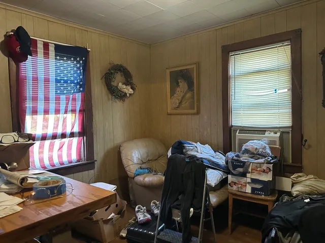 a workspace with furniture and window