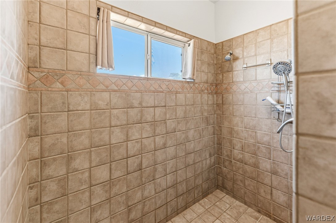 9332 Branded Road Kingman, AZ 86401 - Photo 19 of 44 a bathroom with a shower