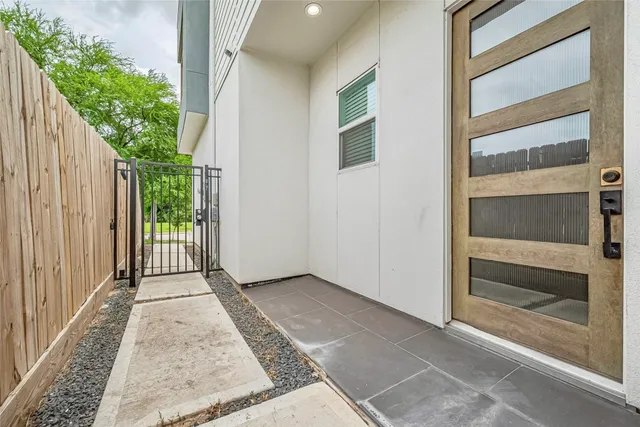 an empty room with wooden floor & closet