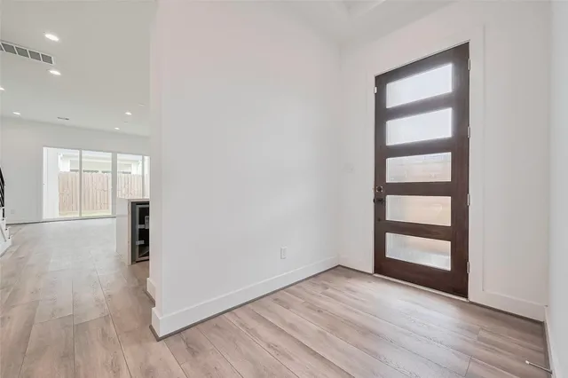 a view of a house with a street