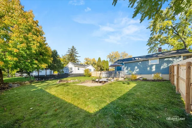 a view of a house with a big yard