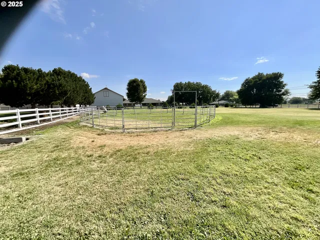 a view of a lake with a big yard