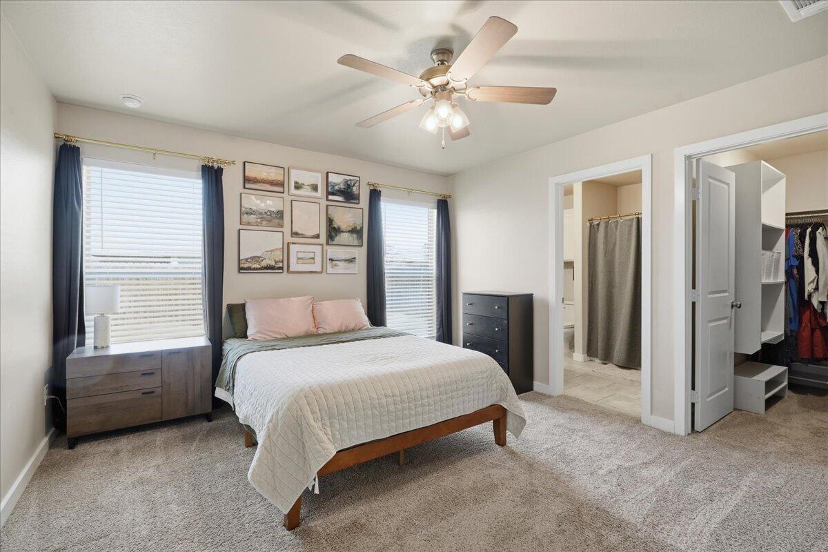 7440 32nd Street Lubbock, TX 79407 - Photo 14 of 29 a bedroom with a bed and a window