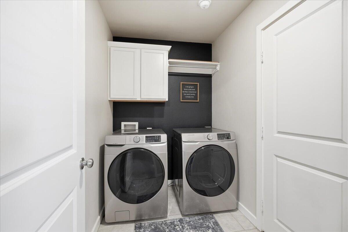 7440 32nd Street Lubbock, TX 79407 - Photo 26 of 29 a utility room with dryer and washer