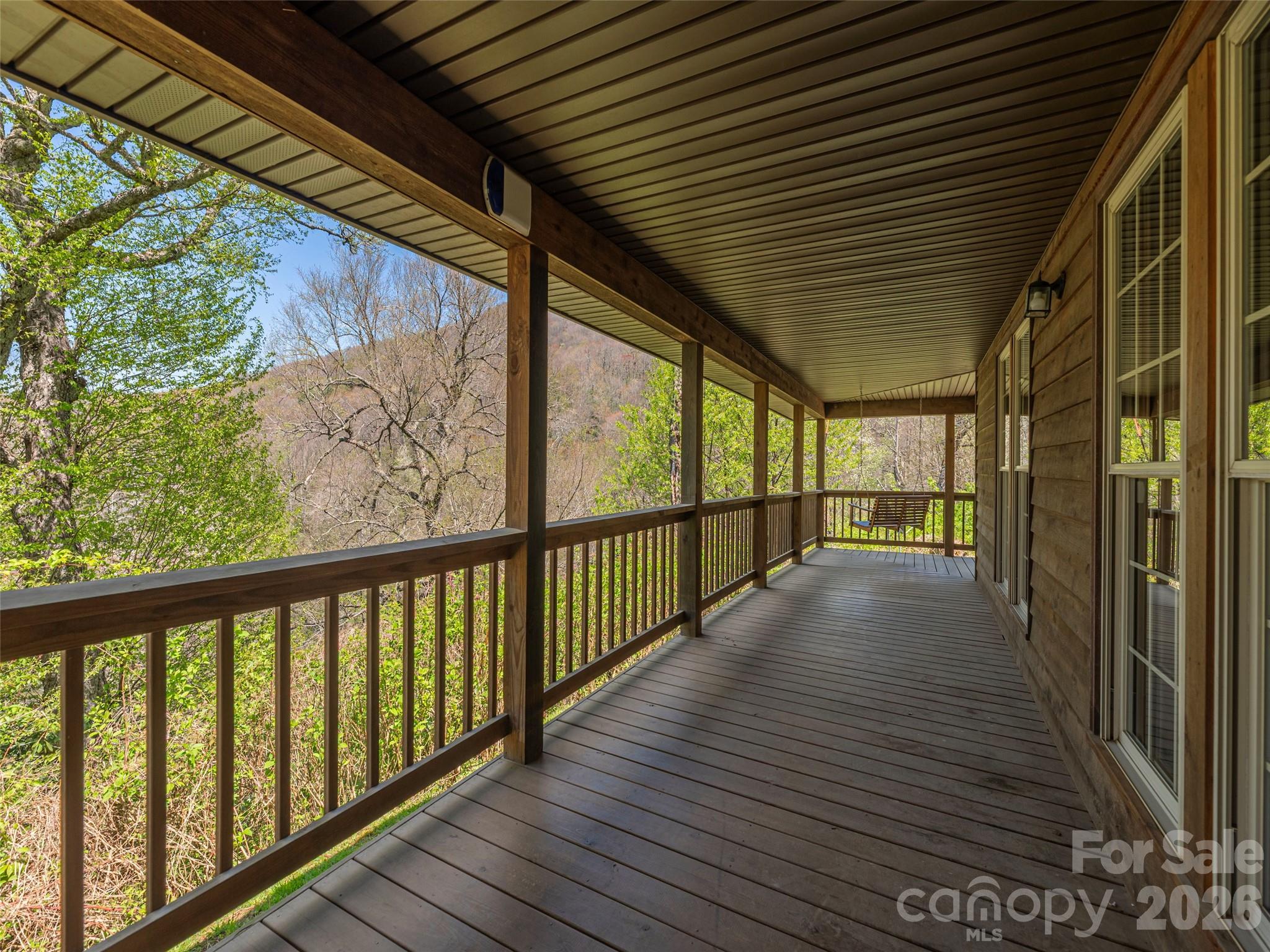 240 Plott Balsam Road Maggie Valley, NC 28751 - Photo 17 of 24 a view of a balcony with wooden floor