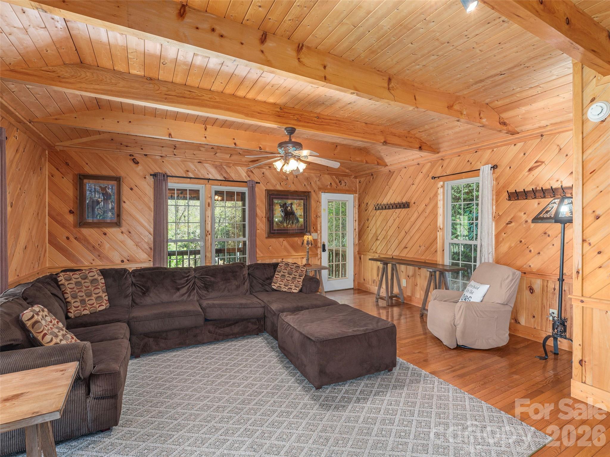 240 Plott Balsam Road Maggie Valley, NC 28751 - Photo 5 of 24 a living room with furniture and a large window