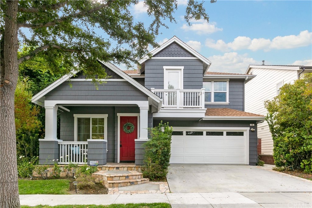4 Bainbridge Avenue Ladera Ranch, CA 92694 - Photo 2 of 23 a front view of a house with a garden and plants