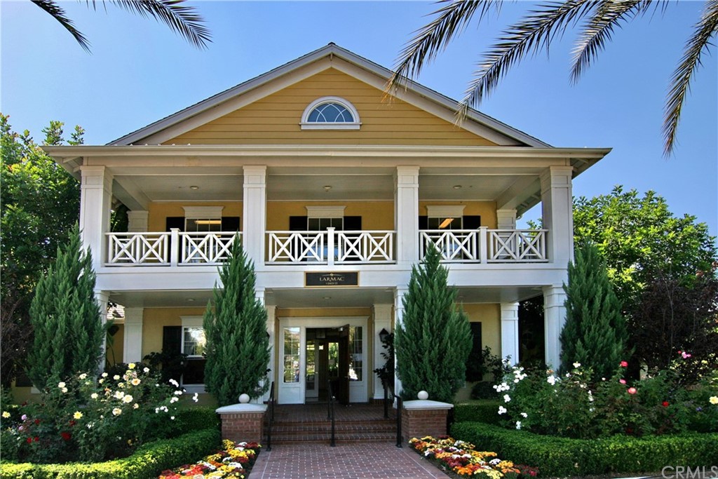 4 Bainbridge Avenue Ladera Ranch, CA 92694 - Photo 20 of 23 a front view of a multi story building with yard and retail shops