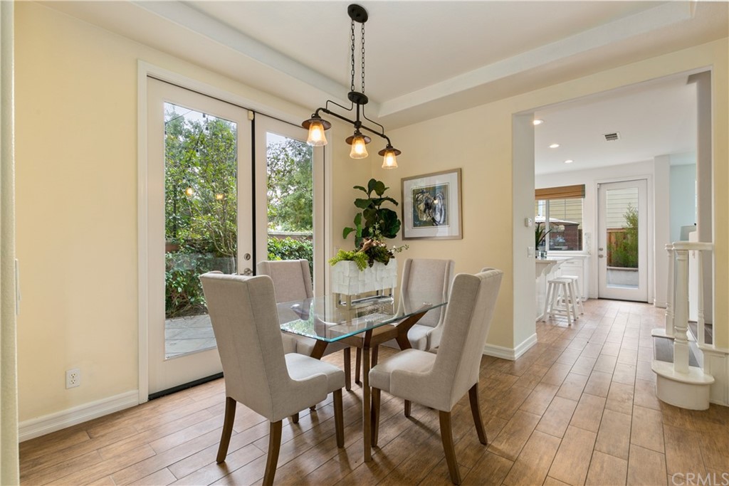 4 Bainbridge Avenue Ladera Ranch, CA 92694 - Photo 5 of 23 a dining room with furniture wooden floor a chandelier