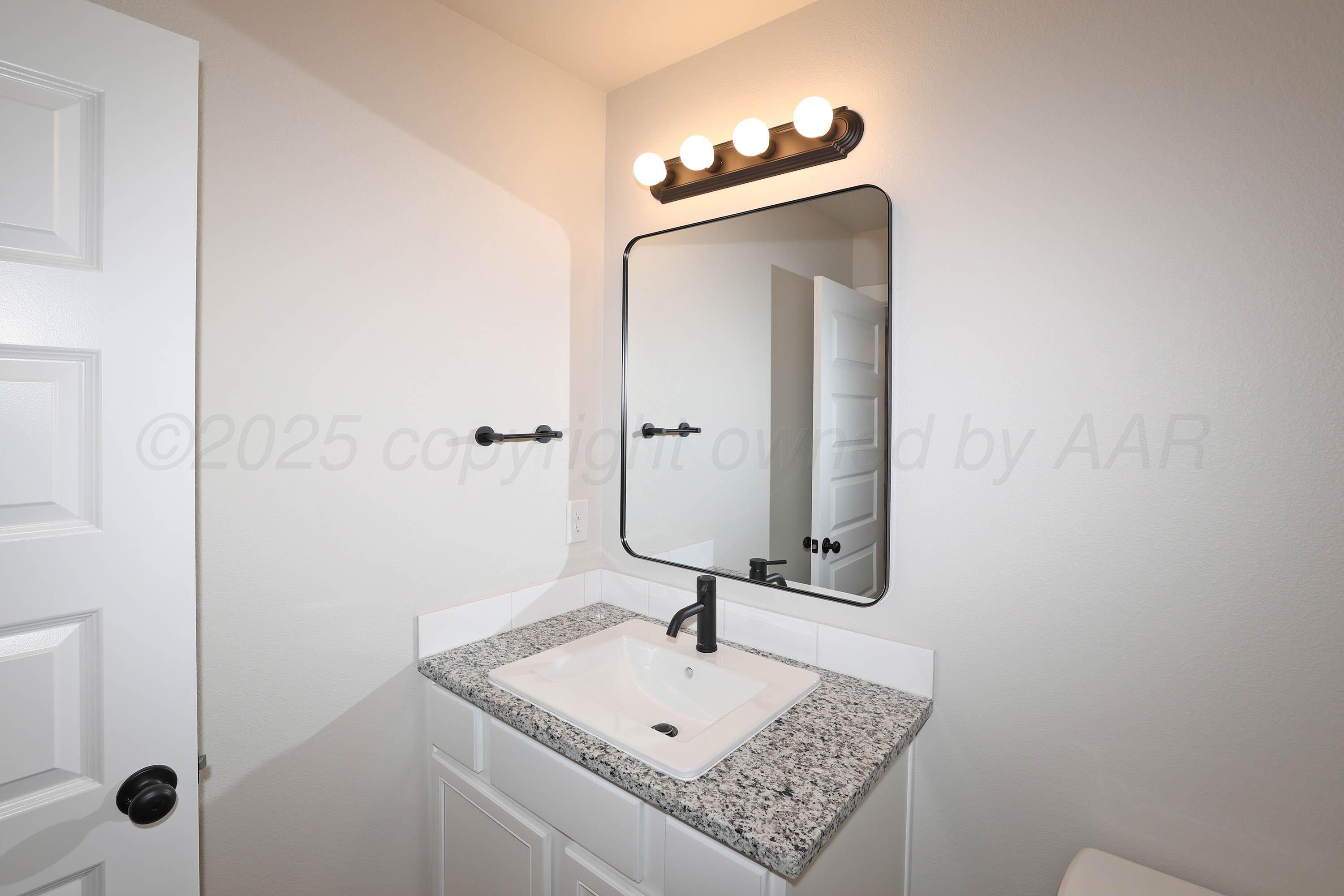 9704 Firewood Lane Amarillo, TX 79124 - Photo 27 of 32 27-Bathroom Vanity