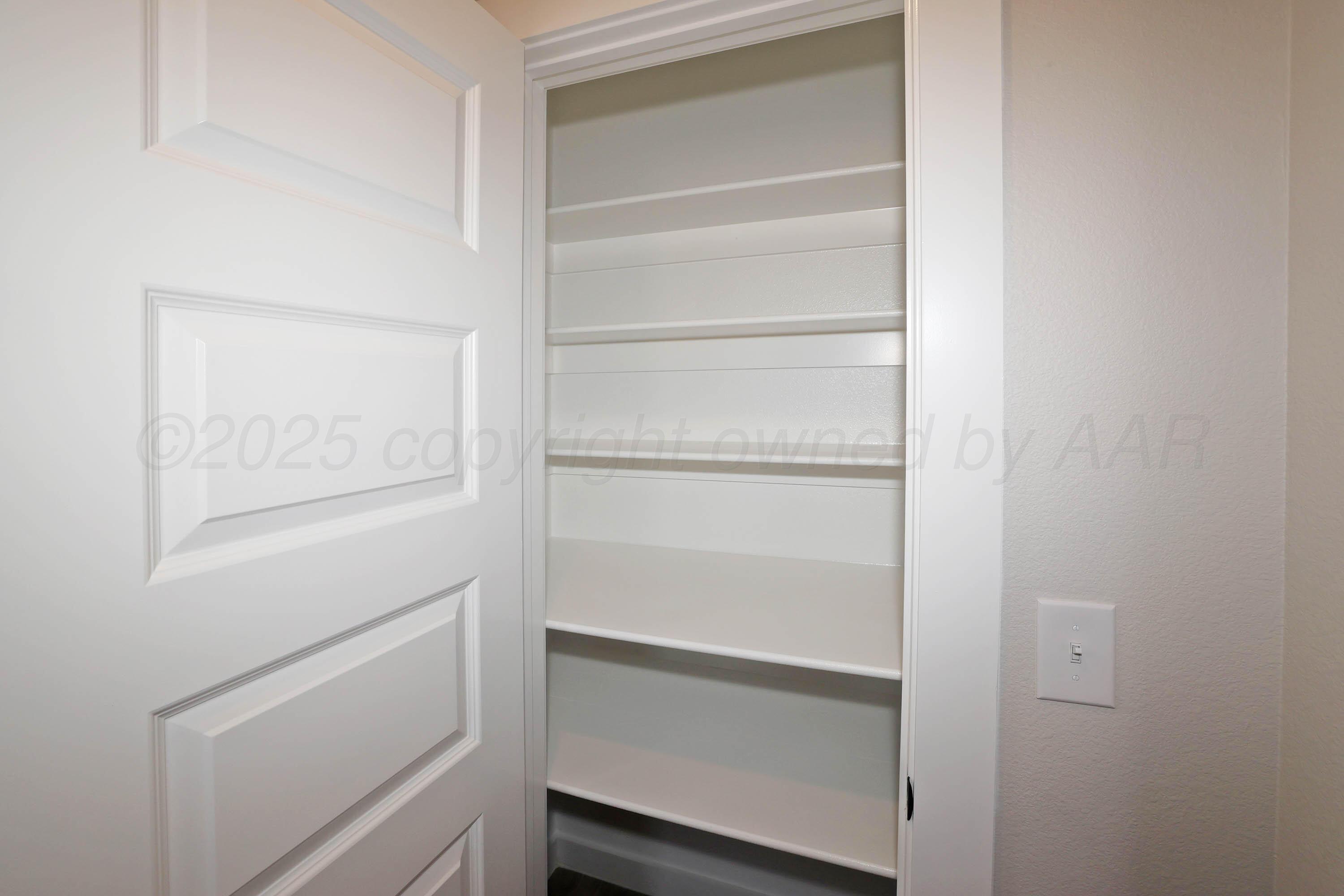 9704 Firewood Lane Amarillo, TX 79124 - Photo 28 of 32 28-Hallway Linen Closet