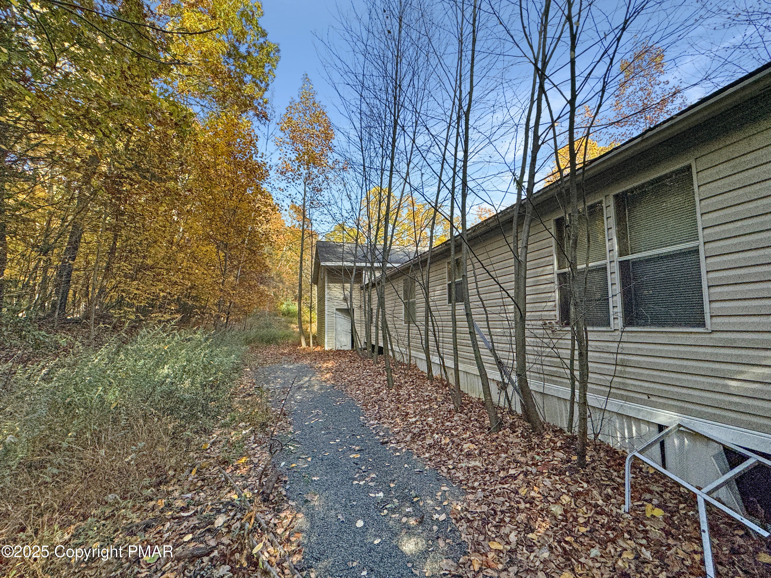 228 Victory Lane Stroudsburg, PA 18360 - Photo 7 of 8 a backyard of a house with lots of green space