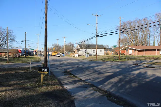 a view of a street with cars