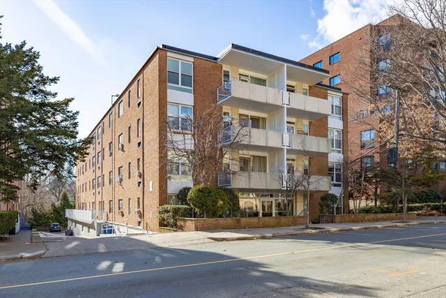 a view of a building and a street