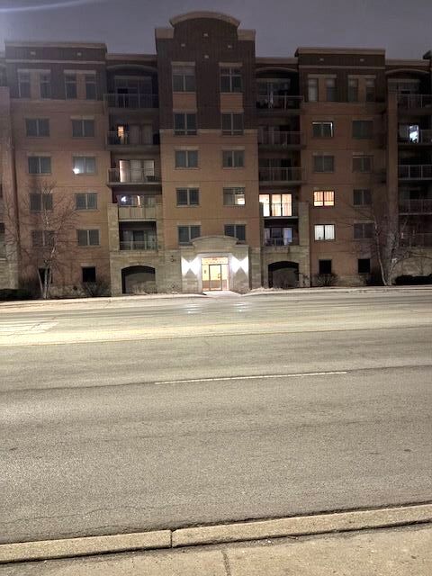 77 North Wolf Road, Unit 210 Northlake, IL 60164 - Photo 16 of 16 a view of building with a street