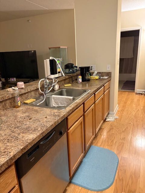 77 North Wolf Road, Unit 210 Northlake, IL 60164 - Photo 3 of 16 a kitchen with sink and view of living room