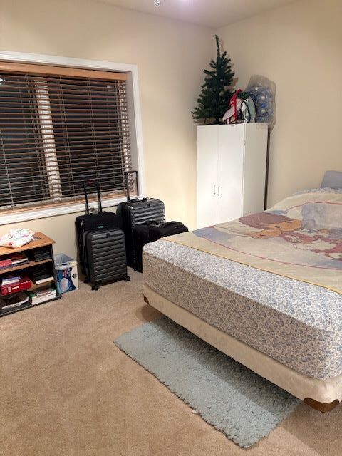 77 North Wolf Road, Unit 210 Northlake, IL 60164 - Photo 7 of 16 a bedroom with bed and large windows