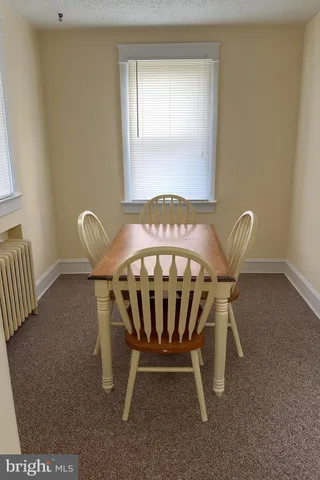 a view of a livingroom with furniture