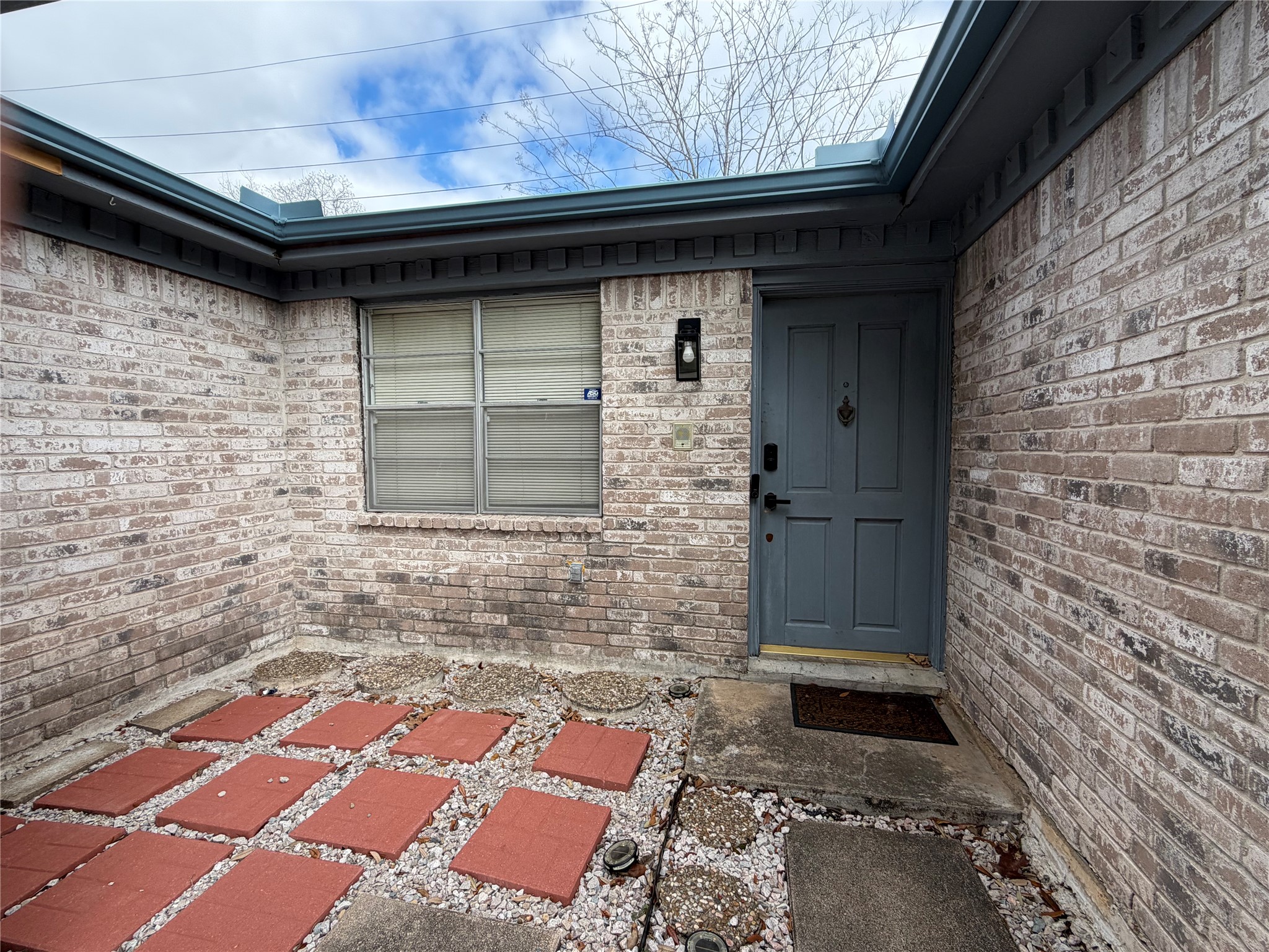 13722 Burgoyne Road Houston, TX 77077 - Photo 2 of 10 a bathroom with a toilet and a shower
