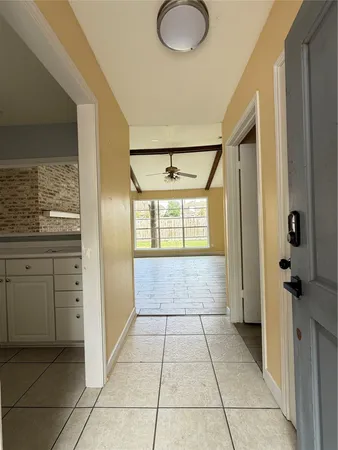 a view of hallway with windows
