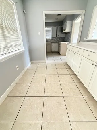 a view of kitchen with windows