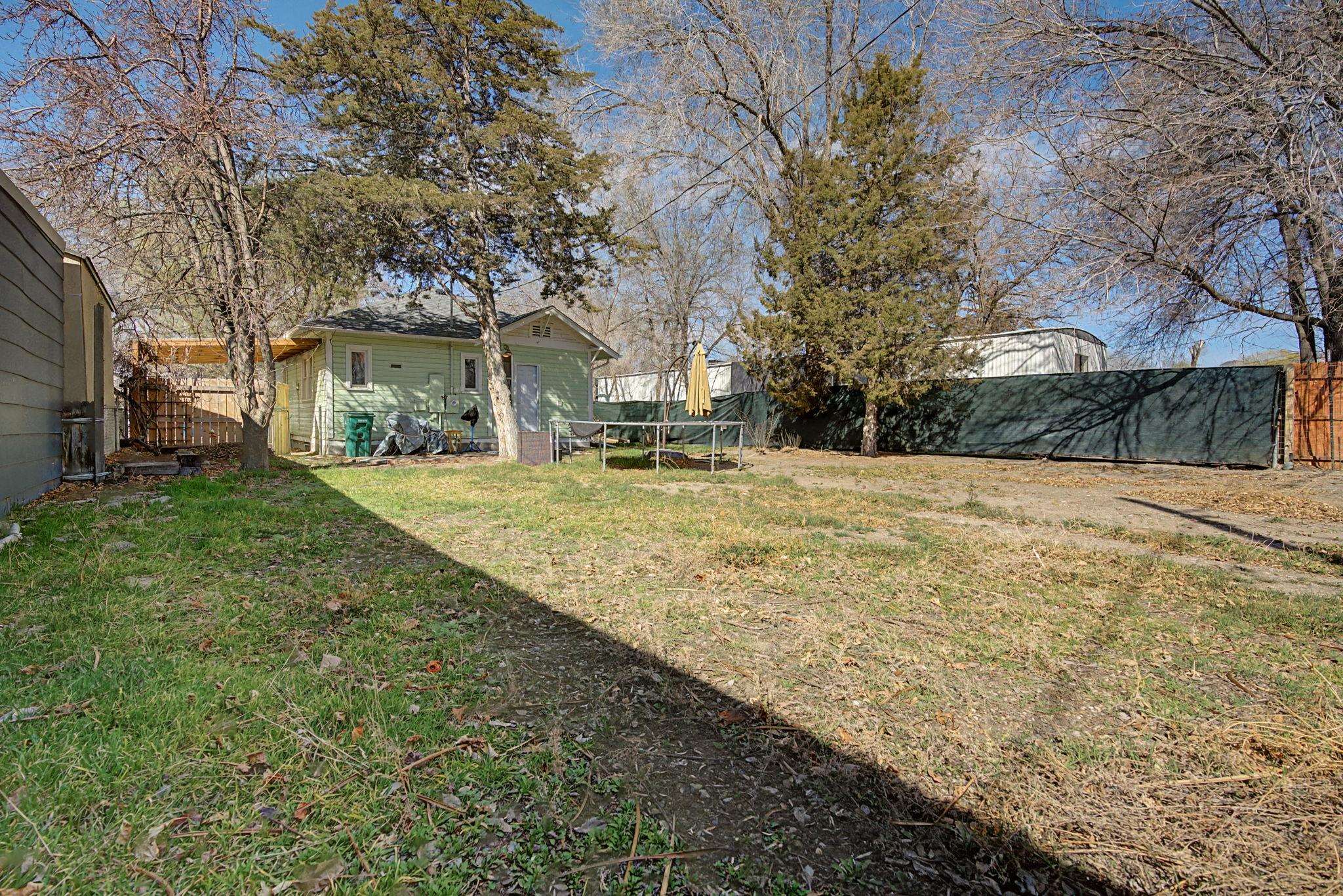 216 4th Street Clifton, CO 81520 - Photo 16 of 17 a view of a yard with a house