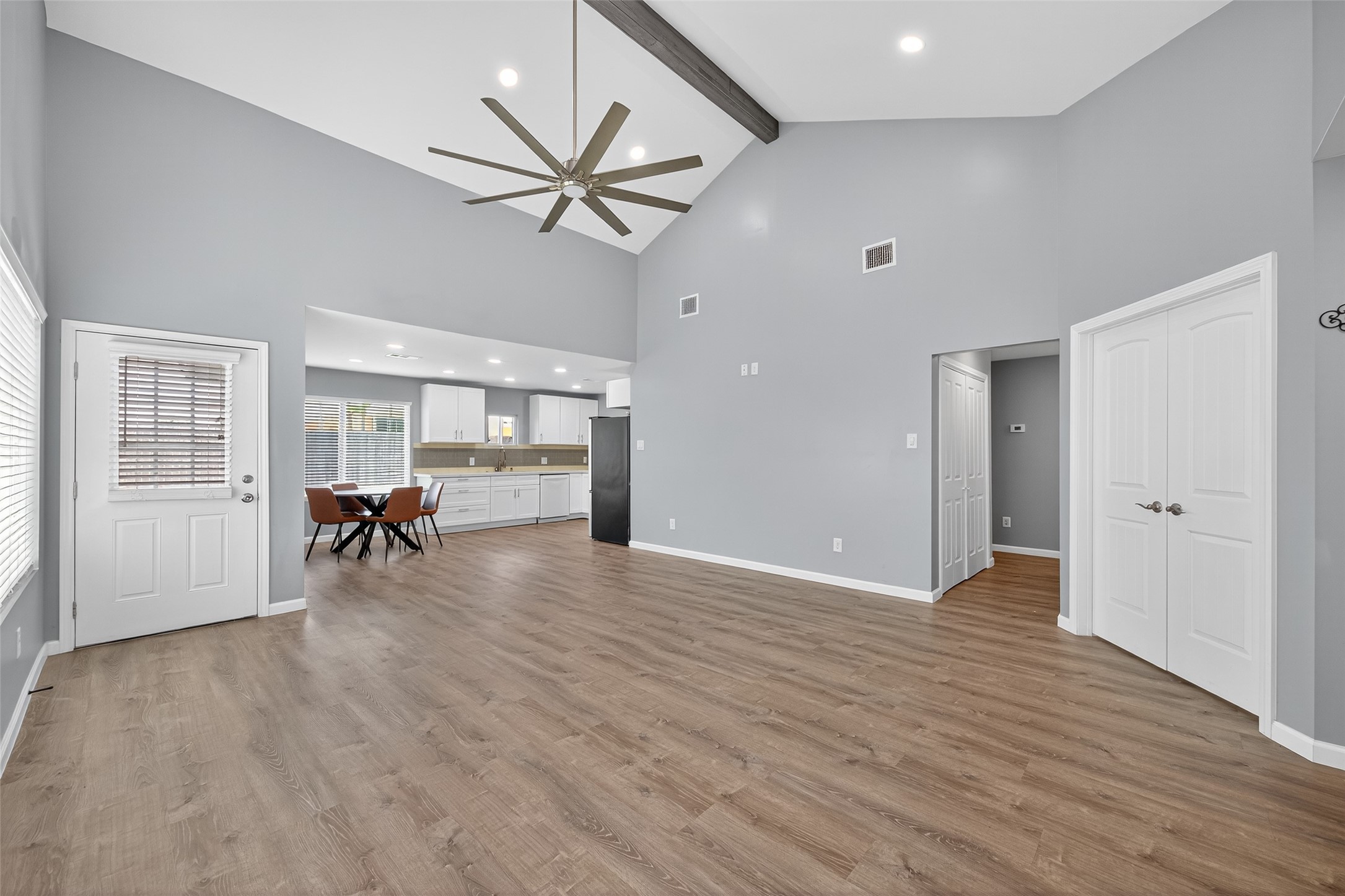 10106 Shadow Pine Drive Houston, TX 77070 - Photo 14 of 39 a view of a livingroom with wooden floor and a ceiling fan