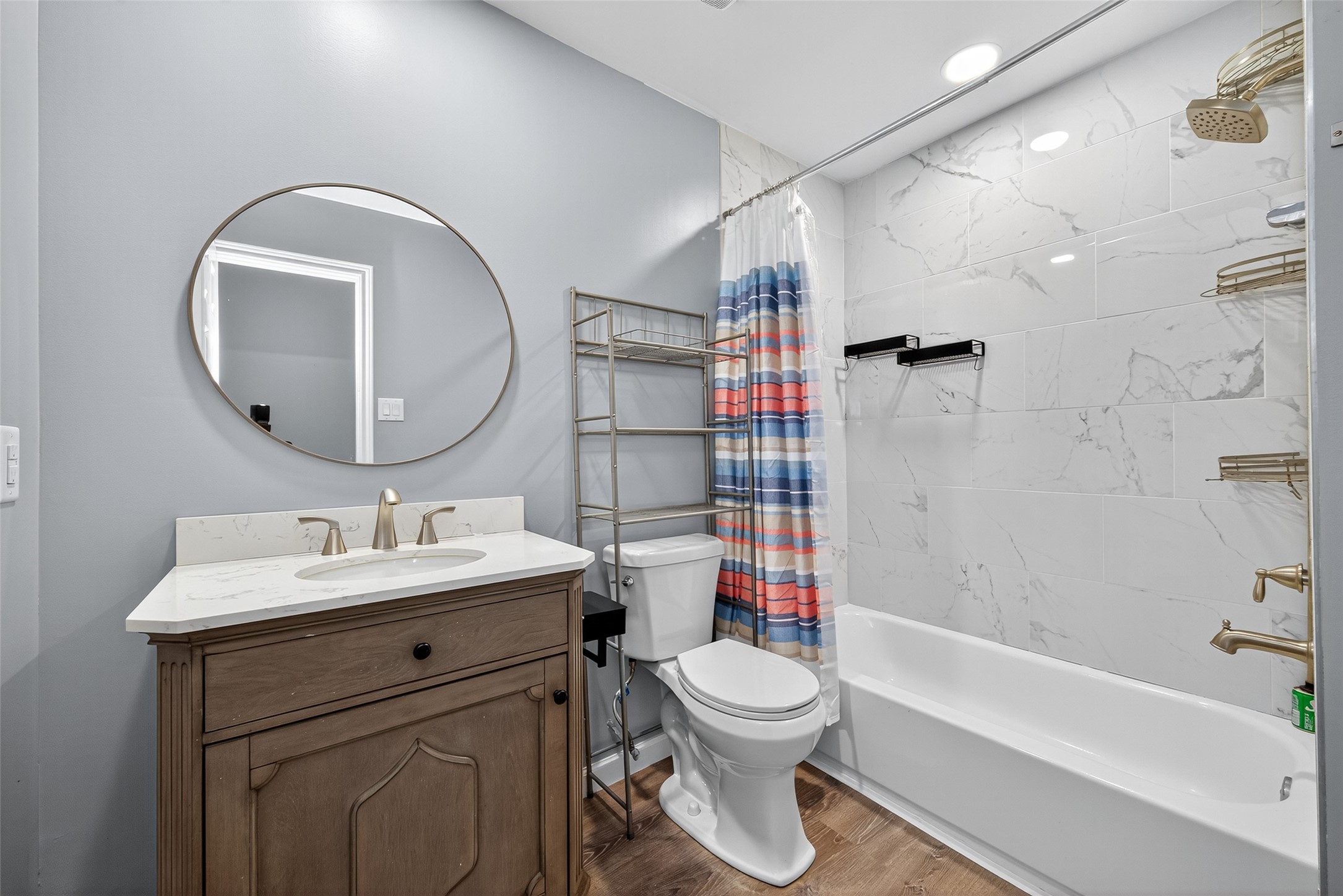 10106 Shadow Pine Drive Houston, TX 77070 - Photo 28 of 39 a bathroom with a sink toilet and shower