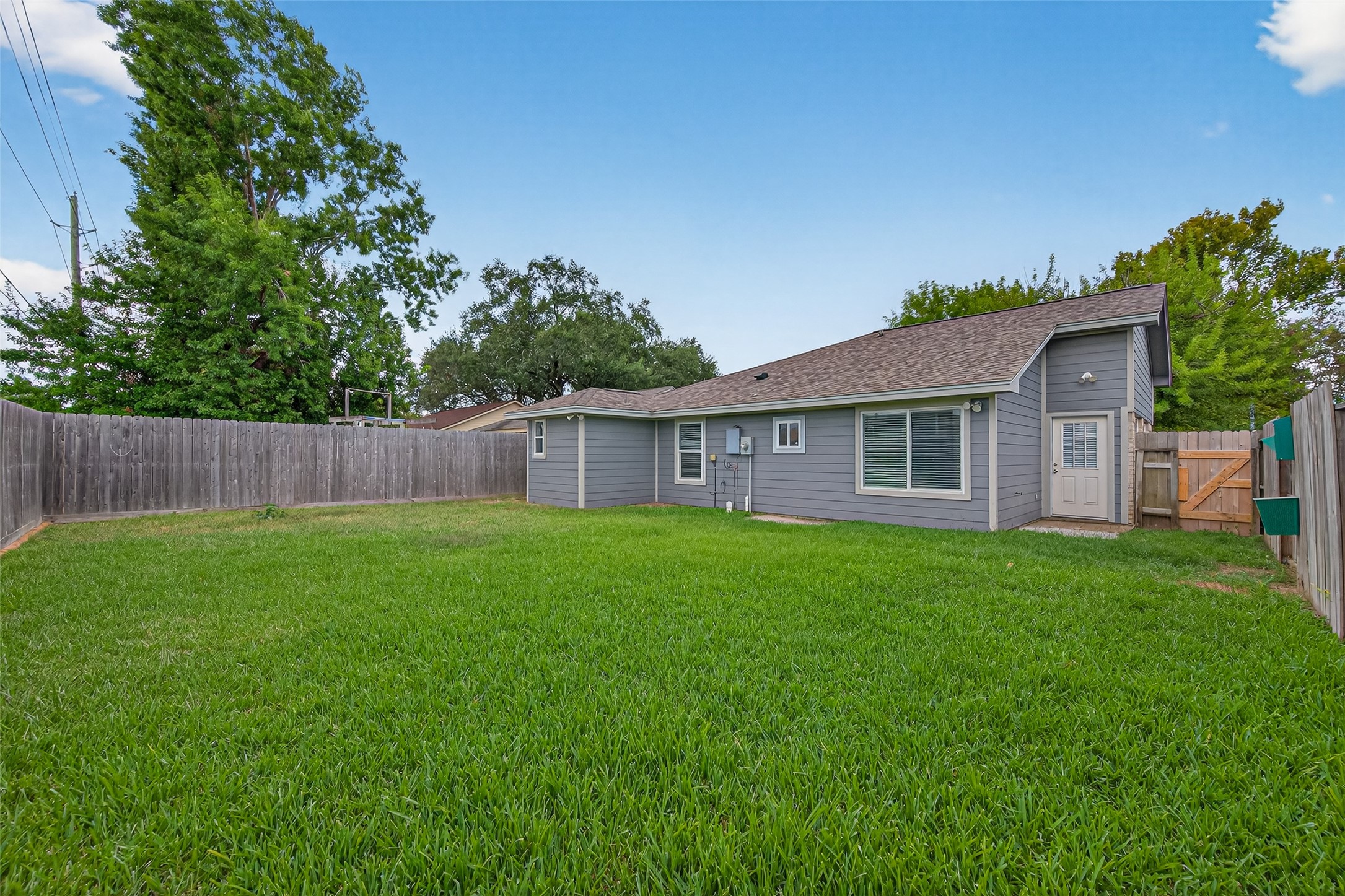 10106 Shadow Pine Drive Houston, TX 77070 - Photo 34 of 39 a view of a house with a yard