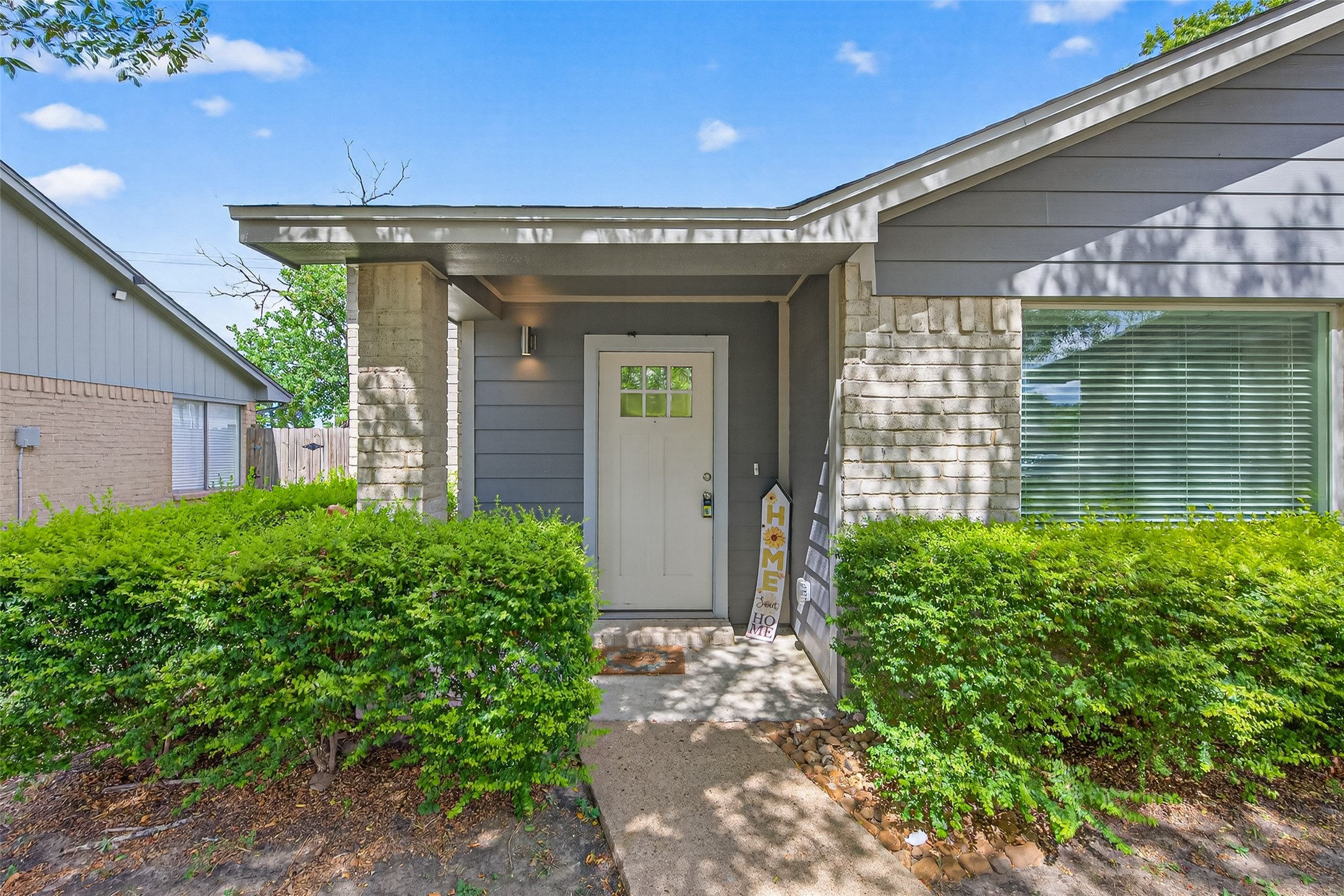 10106 Shadow Pine Drive Houston, TX 77070 - Photo 8 of 39 a view of a house with a flower garden