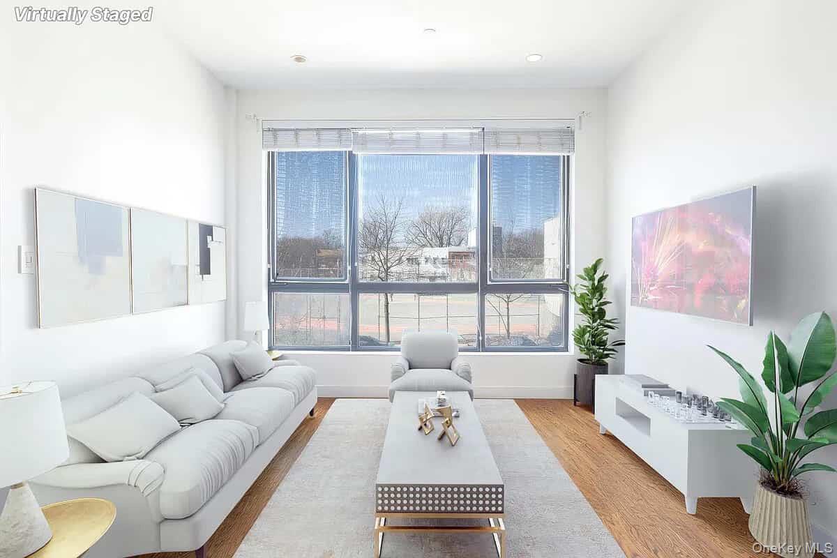 116 Covert Street, Unit 2A Brooklyn, NY 11207 - Photo 4 of 6 Living room with wood finished floors and baseboards