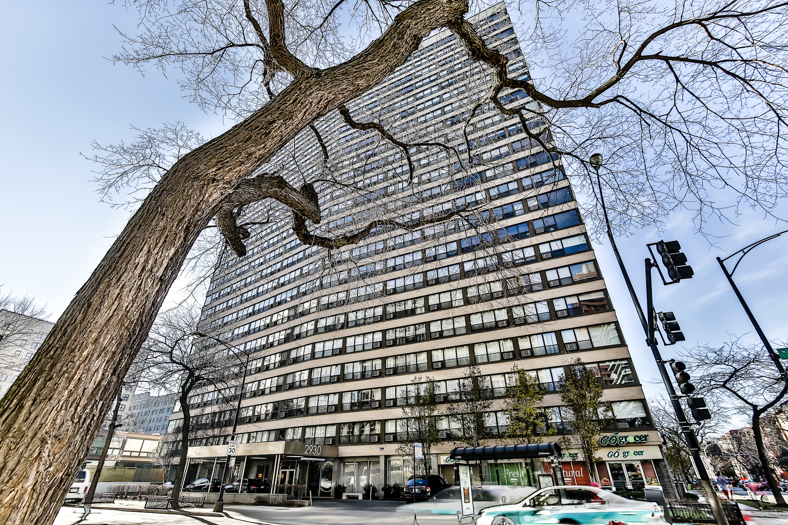 2930 North Sheridan Road, Unit 1401 Chicago, IL 60657 - Photo 2 of 23 a front view of a building