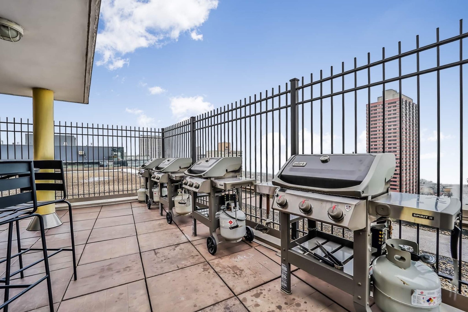 2930 North Sheridan Road, Unit 1401 Chicago, IL 60657 - Photo 21 of 23 a view of a chairs and table in the balcony