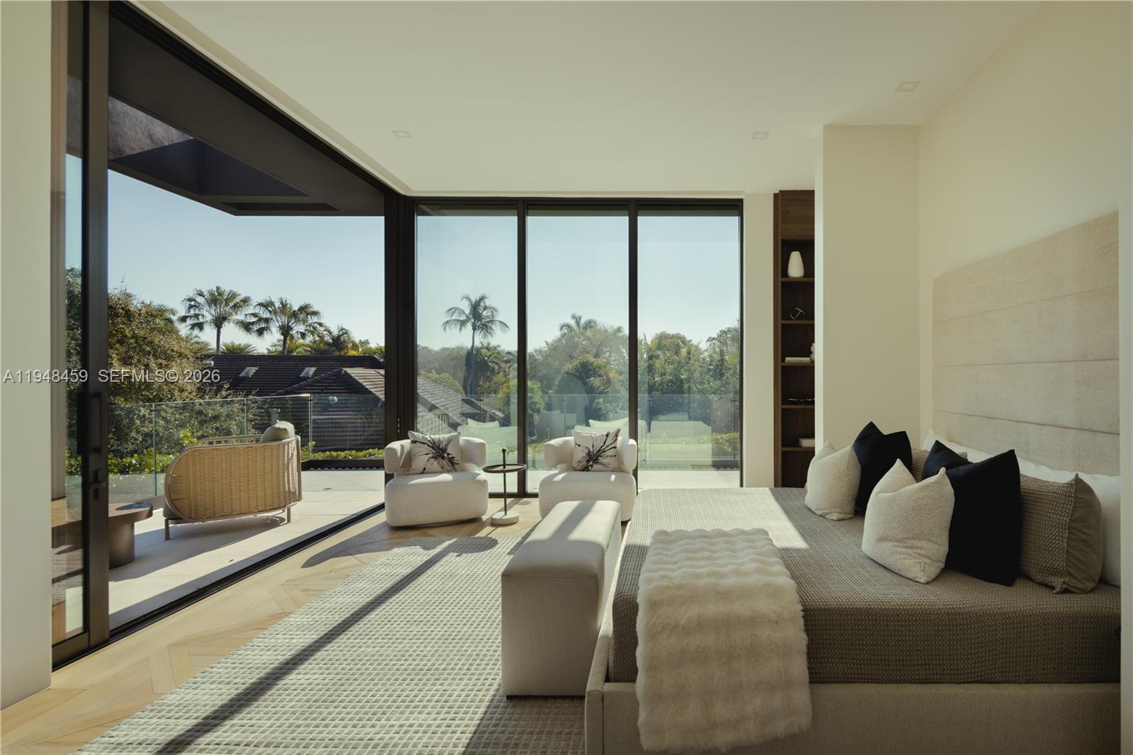 5845 Southwest 130th Terrace Pinecrest, FL 33156 - Photo 11 of 55 a bedroom with furniture and a large window