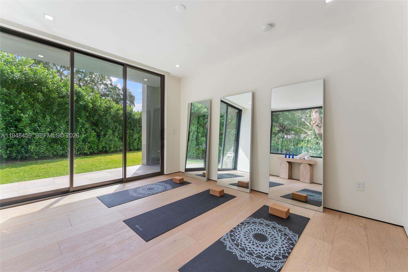 5845 Southwest 130th Terrace Pinecrest, FL 33156 - Photo 28 of 44 a living room with a large window