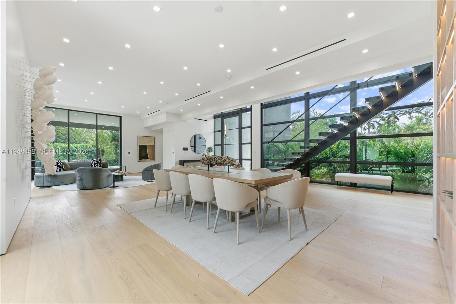 5845 Southwest 130th Terrace Pinecrest, FL 33156 - Photo 31 of 55 a view of a dining room with furniture garden and patio