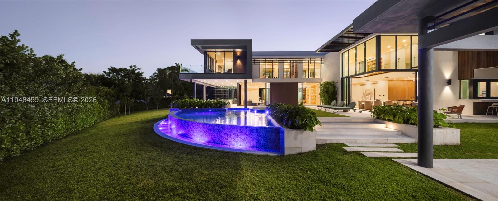 5845 Southwest 130th Terrace Pinecrest, FL 33156 - Photo 5 of 55 a view of an chairs in front of house
