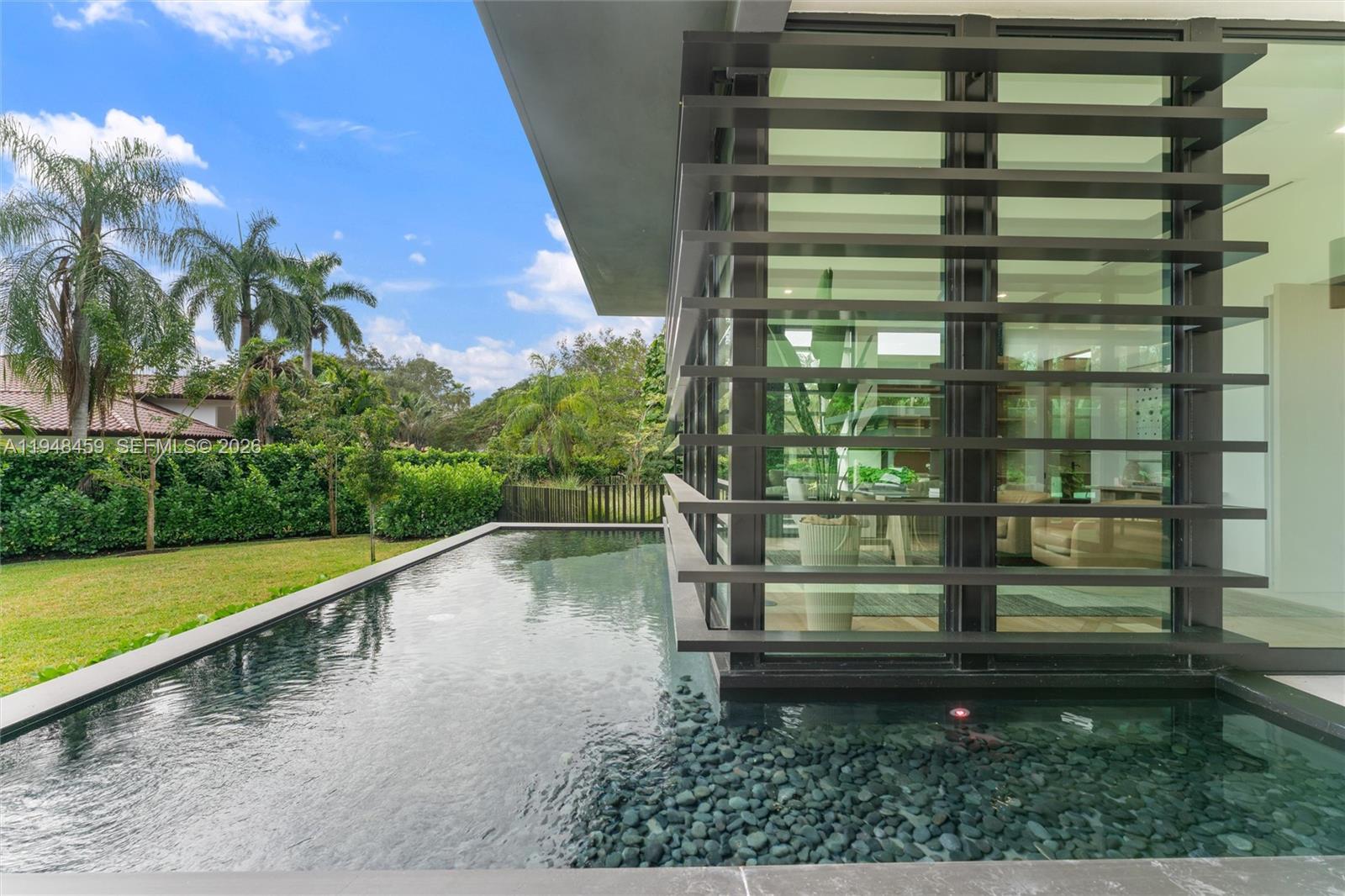 5845 Southwest 130th Terrace Pinecrest, FL 33156 - Photo 53 of 55 a view of a balcony with outdoor space