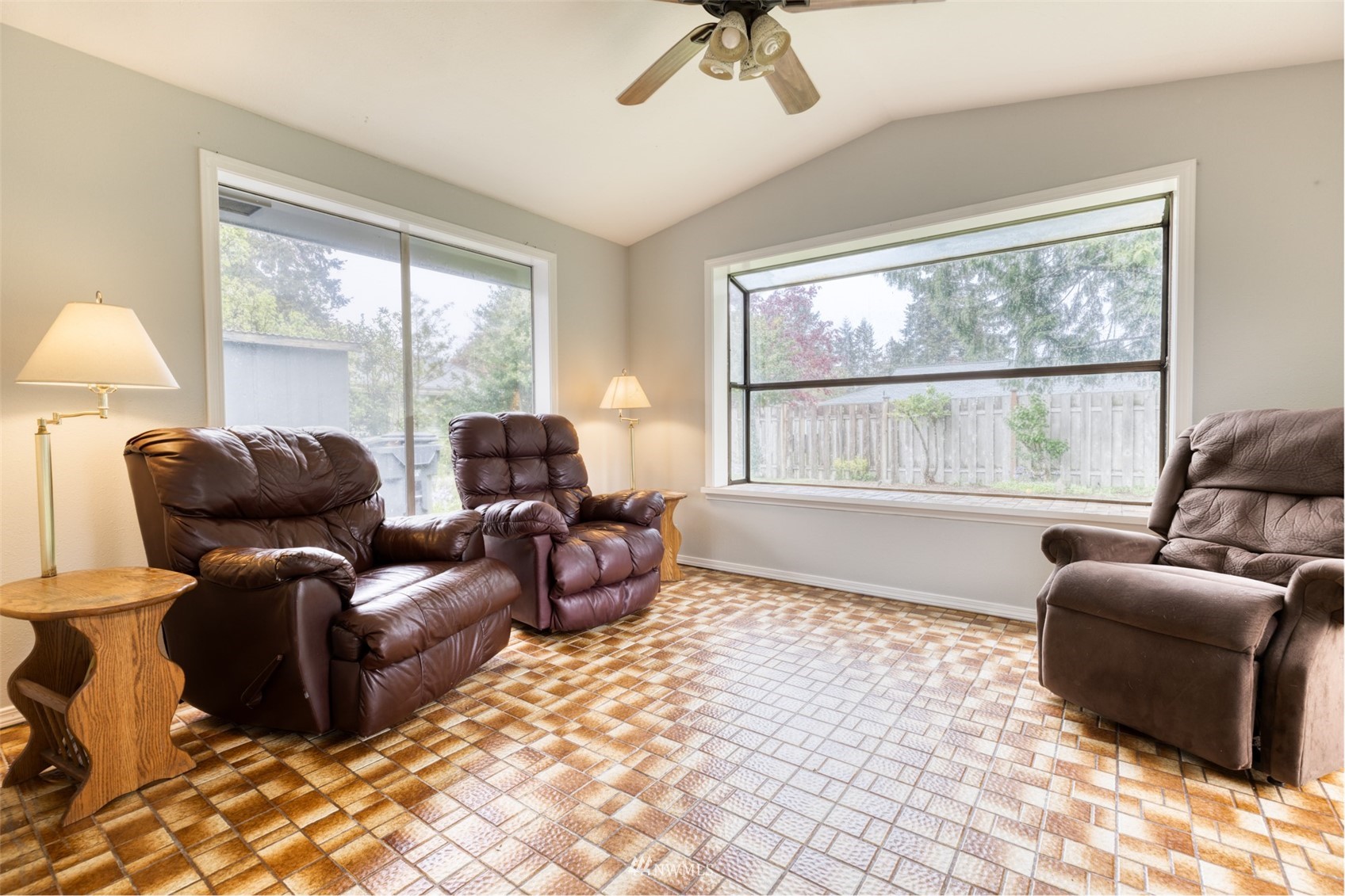 8705 Terrace Road Southwest Lakewood, WA 98498 - Photo 11 of 28 a living room with furniture and a large window