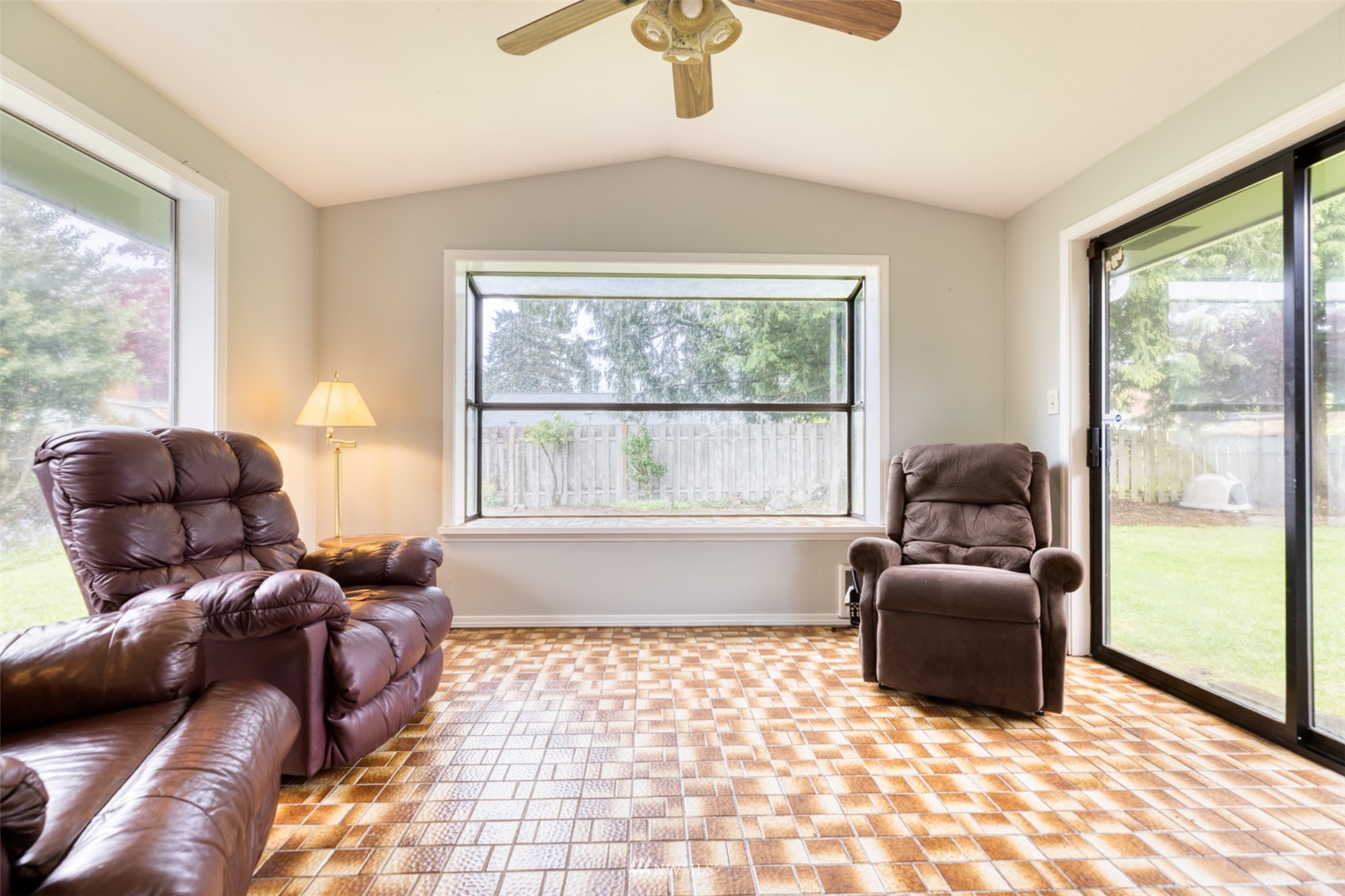 8705 Terrace Road Southwest Lakewood, WA 98498 - Photo 12 of 28 a living room with furniture and a large window